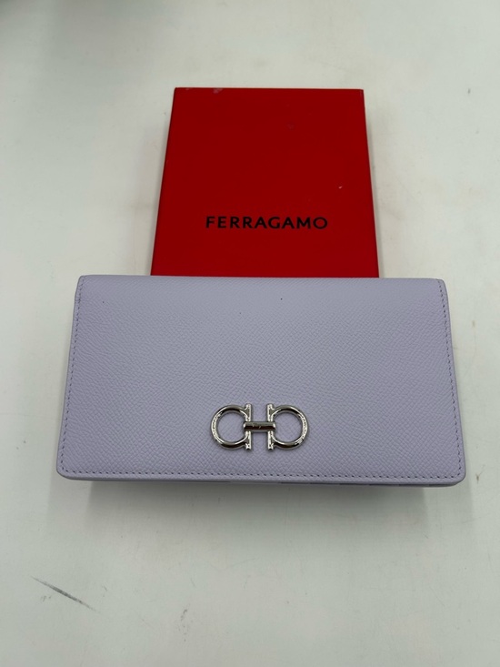 Salvatore Ferragamo Handbags - Women's Salvatore Ferragamo GANCINI bifold Wallet in light blue made in Italy